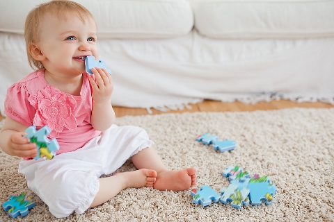 Infant On Carpet